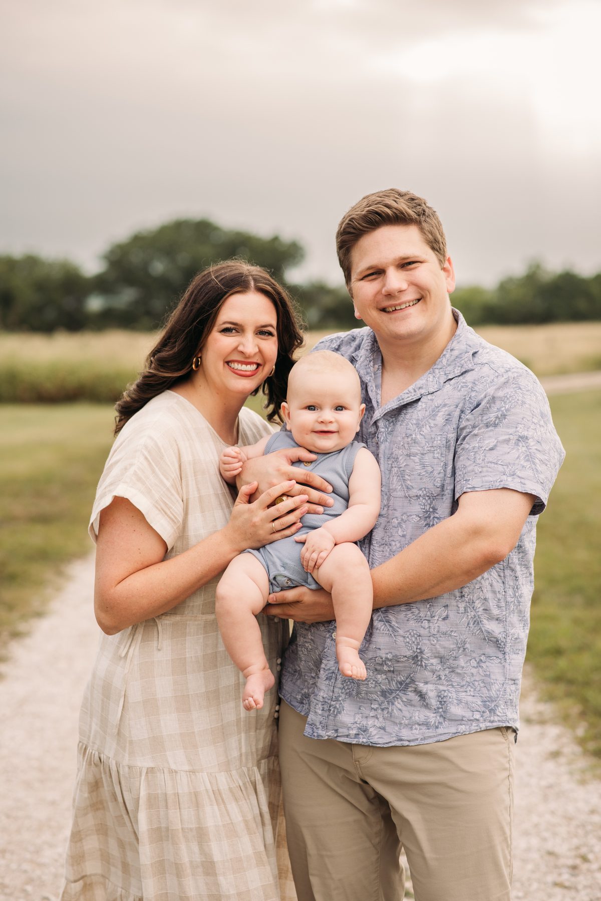 Candid family portrait in soft summer light